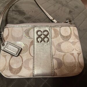 Coach Julia embossed signature sequin wristlet